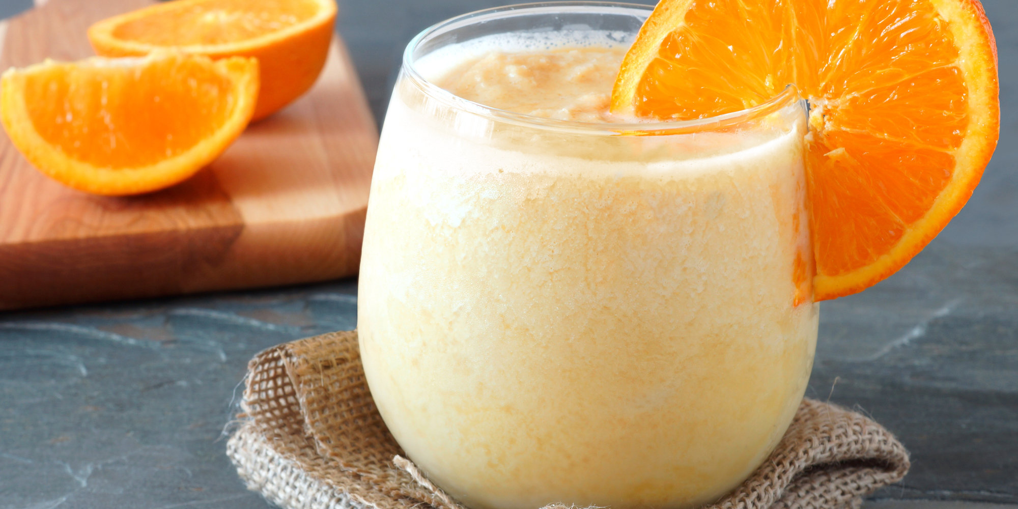 Orange fruit smoothie in a stemless glass ThinkstockPhotos