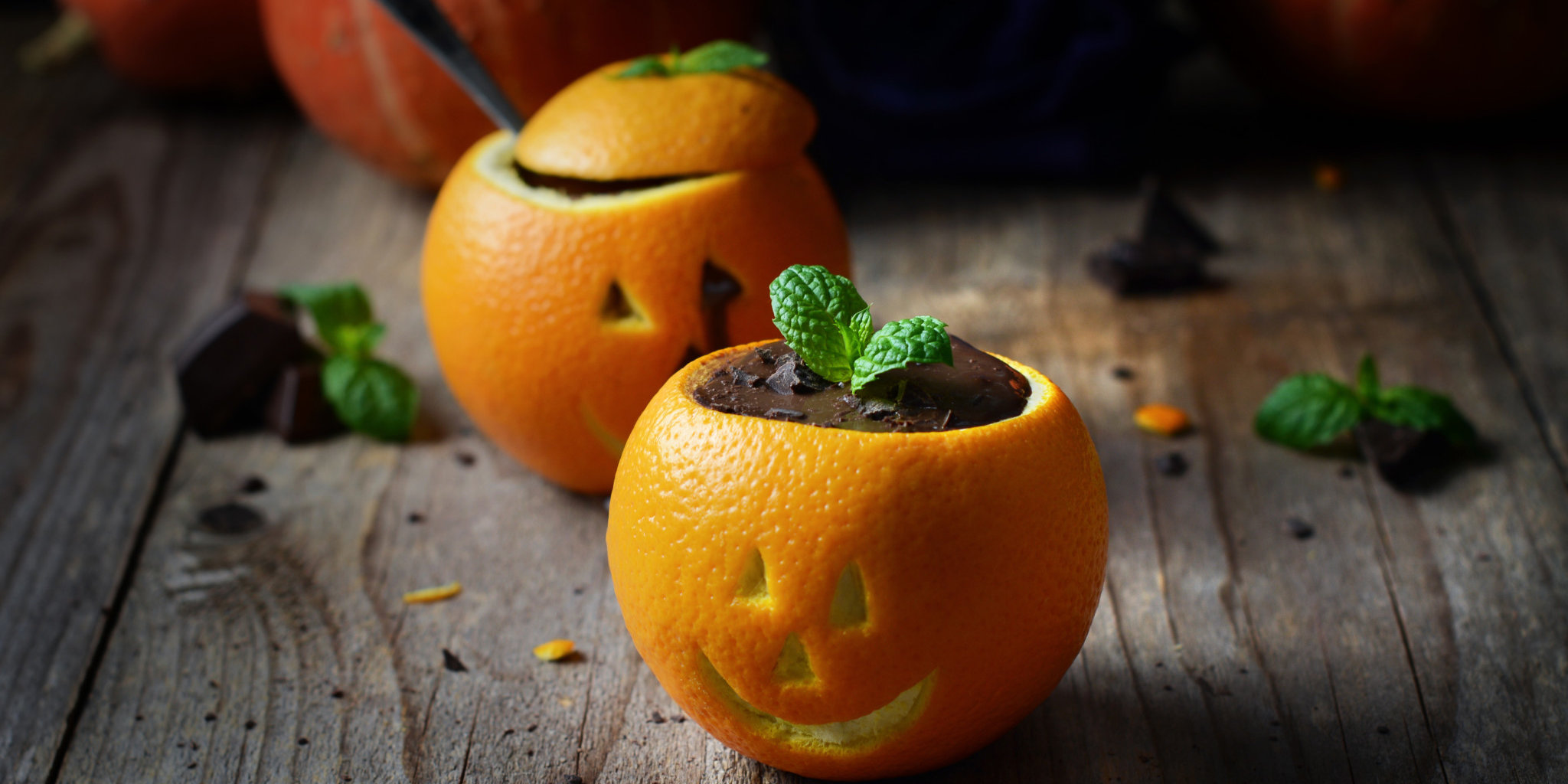 Chocolate mousse in orange cups GettyImages