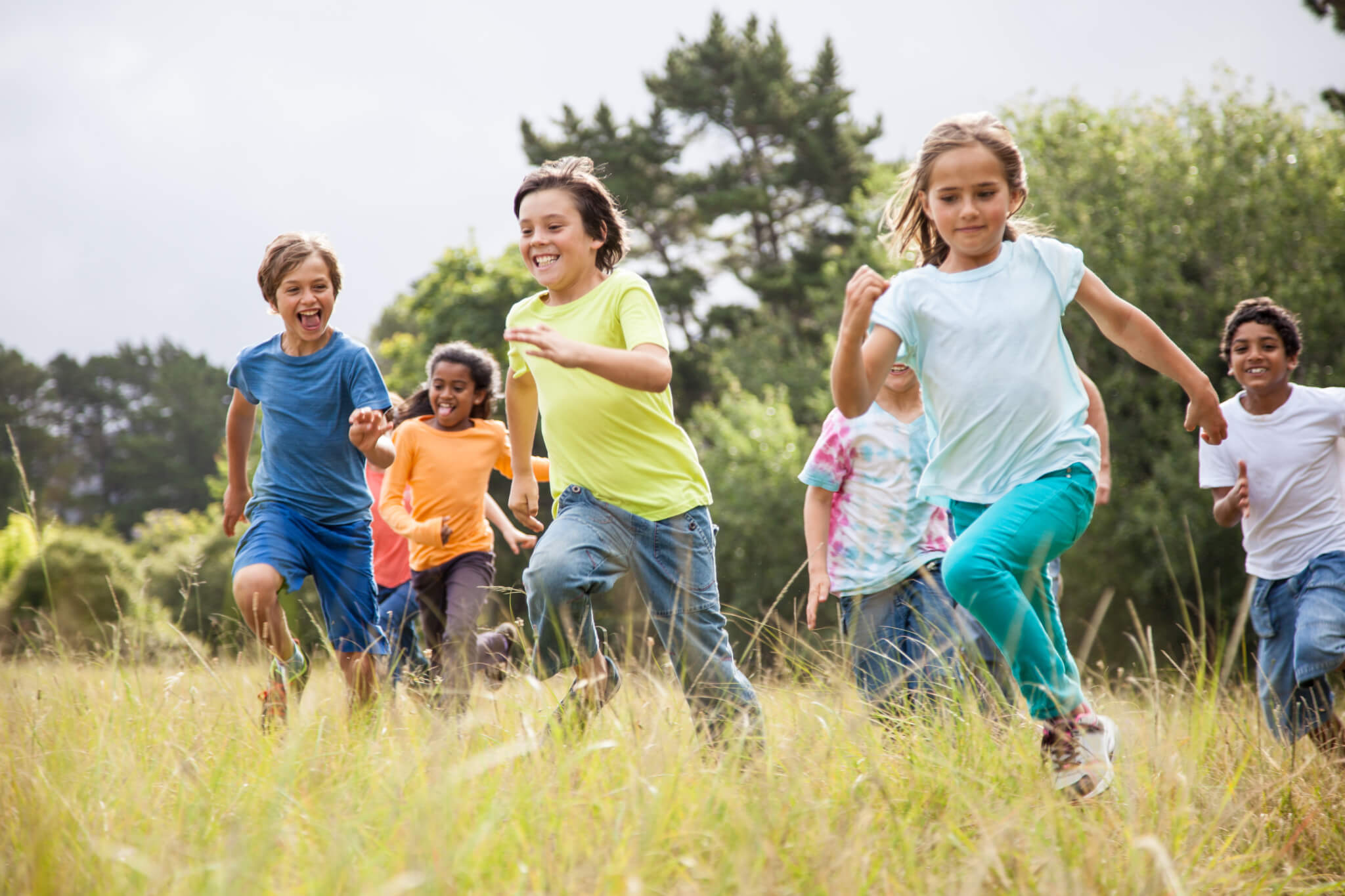 Children running together in a park - Shaklee "Naturally" Blog