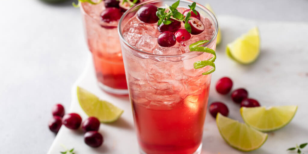 Cranberry and lime cocktail or mocktail, festive refreshing drink idea for the holiday dinner